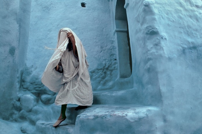 MOROCCO. Rif. Chechaouen. 1987. Street life in the Rif mountains. Walls are often painted in blue and white.